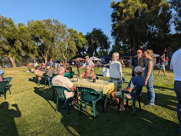 Full tables with attendees hanging out